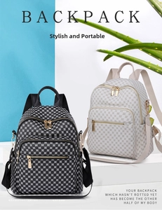 Detail view of stylish backpacks with circular floral patterns and gold zipper accents