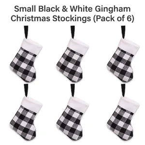 Detailed set of six small black and white plaid Christmas stockings with plush white cuffs