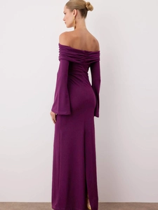 Elegant deep purple off-shoulder bodycon dress with flared sleeves and a back slit detail