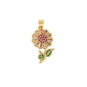 Gold sunflower pendant with purple and green zircon crystals on a white background