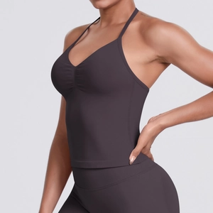 Side view of seamless deep plum yoga set featuring V-neck bra and high waist leggings