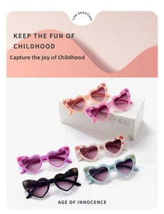 Detailed view of six colorful heart-shaped kids sunglasses with flower patterns