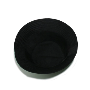 Internal view of black St. Patrick's Day bucket hat showing smooth stitching and green brim detail
