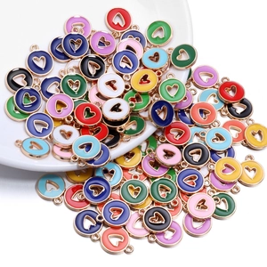 Colorful heart-shaped enamel charms in assorted candy colors for DIY jewelry making