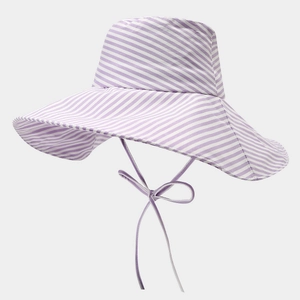 Detail of wide brim sun hat with light purple stripes and a delicate bow strap
