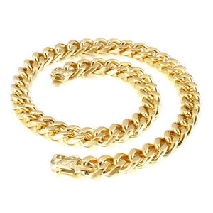 Polished golden stainless steel Cuban link chain necklace in a spiral layout