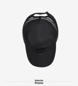 Detail view of the breathable mesh interior and sweatband of this black flat top army cap
