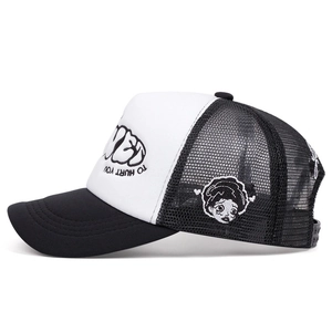 Retro embroidered mesh trucker hat in black and white with character patch and typography