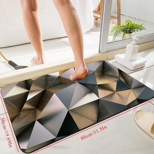 Detail view of 80x50cm geometric bathroom mat with anti-slip texture and modern design