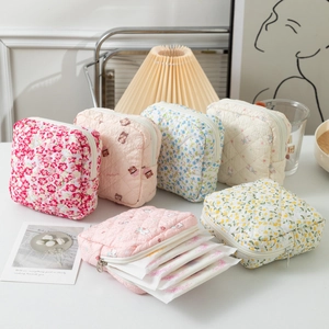 Quilted cotton portable storage pouch for sanitary pads with floral prints and zipper