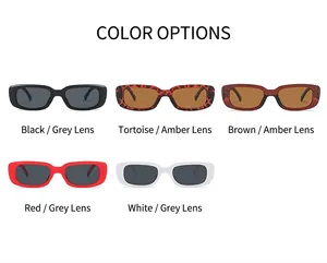 Detail showing five assorted retro rectangular sunglasses in various frame and lens colors