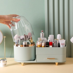 Rotating mint green makeup organizer with dust-proof cover and elegant gold accents