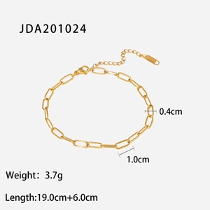 Macro shot of 18K gold plated paperclip chain showing detailed links and measurements