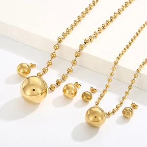 Minimalist gold hollow ball stainless steel jewelry set including necklaces and earrings