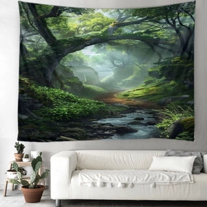 Detailed view of large forest tapestry hanging on a wall behind a white sofa in a room