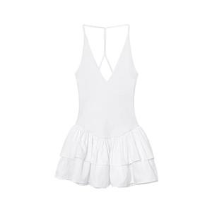 White halter neck mini dress with layered ruffle hem and deep V-neckline in knit fabric