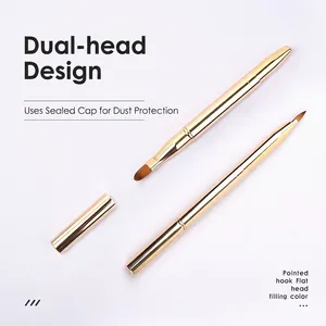 Dual-head retractable lip brush with gold metal finish and protective caps