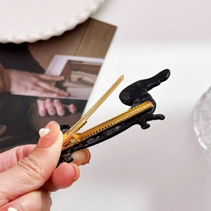 Dachshund shaped acetate hair clip with rhinestones and golden metal jaw clamp