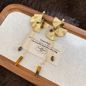 Tiger eye stone ginkgo leaf tassel earrings with gold finish and vintage ethnic design