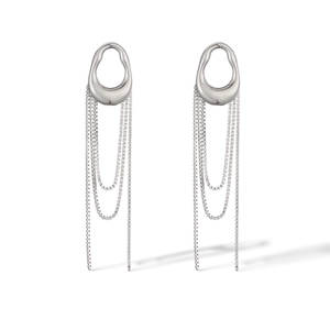 Detail view of silver tassel earrings with irregular oval metal plates and hanging chains