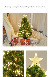 Macro detail of artificial fiber optic Christmas tree with LED star topper and glowing beads