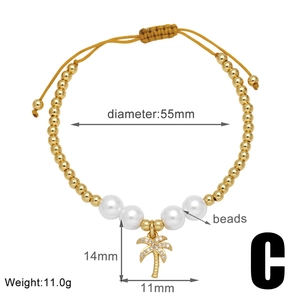 Detail of beaded bracelet showing 55mm diameter and coconut tree charm specifications