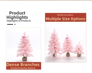 Detail of pink flocked mini Christmas trees with snowy branches and burlap base