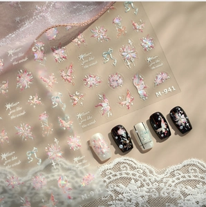 Detail of M-941 holographic butterfly and floral nail stickers on display tips