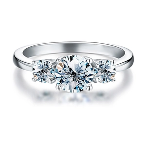 Elegant 1 carat Moissanite three-stone ring in 925 sterling silver with a mirror reflection