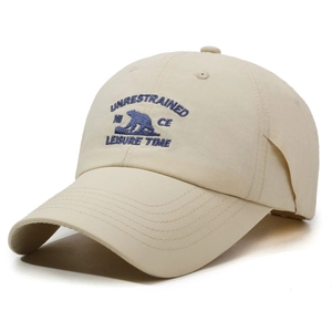 Beige quick-dry baseball cap with navy bear embroidery and breathable soft top design