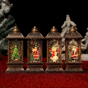 Antique bronze Christmas lantern water globes with Santa and snowman figurines inside