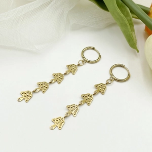 Golden titanium steel dangle earrings featuring four tiered mushroom charms with dots