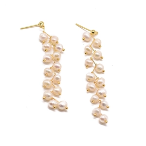 Handmade 18k gold plated long drop earrings featuring natural baroque freshwater pearls