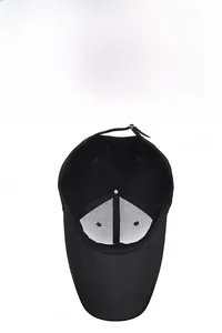 Detail view of the black baseball cap interior featuring a breathable white mesh lining