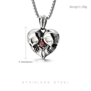 Detailed view of punk skull heart pendant with ruby gemstone, 34x34mm stainless steel