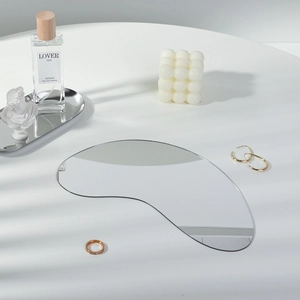 Irregular silver acrylic mirror tray used for professional perfume photography