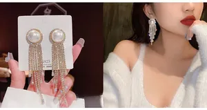 Detail of S925 silver needle pearl earrings with long tassel on model and display card