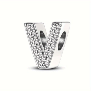 Close-up of V-shaped silver charm bead with pavé cubic zirconia for DIY jewelry