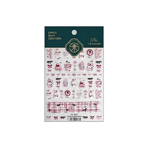 Christmas nail stickers with red and white bows, snowmen, and hearts designs TS-3957