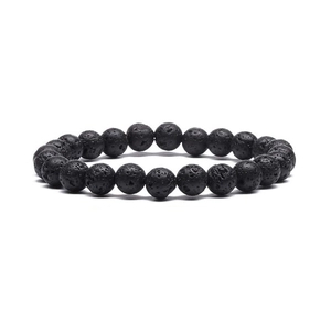 Natural black volcanic stone bead bracelet with magnetic stones on a clean white background