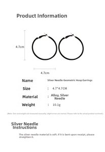 Detail view of 4.7cm matte black hoop earrings featuring S925 silver needles