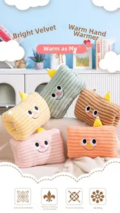 Detailed close-up of colorful striped plush hand warmers with cute embroidered expressions