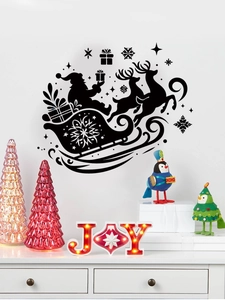Detailed view of black Christmas wall decals featuring Santa, reindeer, and snowflakes