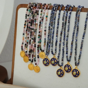 Handmade beaded necklace with 316L stainless steel angel pendant and blue enamel sun motif