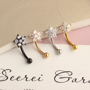 Curved eyebrow rings with cubic zirconia flower tops in black, rose gold, silver, and gold