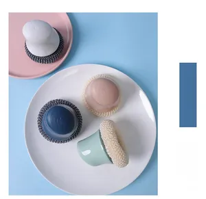 Close-up of colorful kitchen dish brushes with ergonomic handles and durable bristle heads