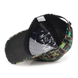 Detail of sequin baseball cap showing interior lining, curved brim and material label