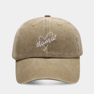 Close-up of white Mama embroidery on khaki washed cotton baseball cap with high detail