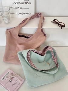Minimalist leopard print faux suede tote bag in pink and green with a stylish retro look