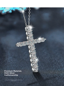 Macro detail of S925 sterling silver cross pendant featuring sparkling moissanite stones